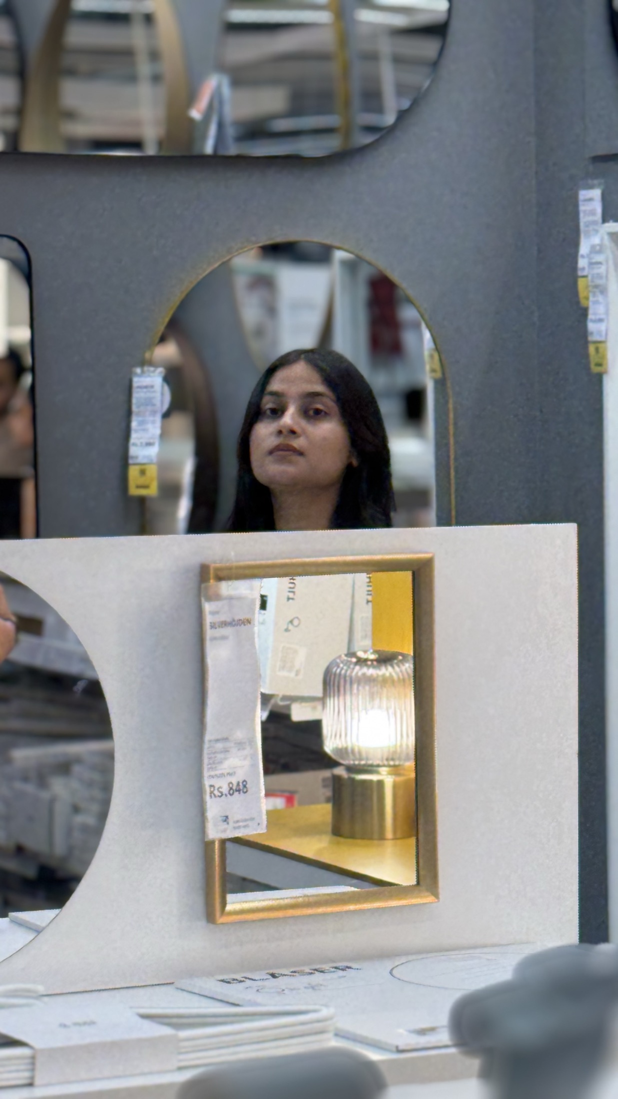 Reflection in an arched mirror